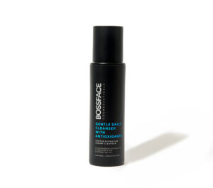Bossface gentle cleanser in a black bottle standing with white background