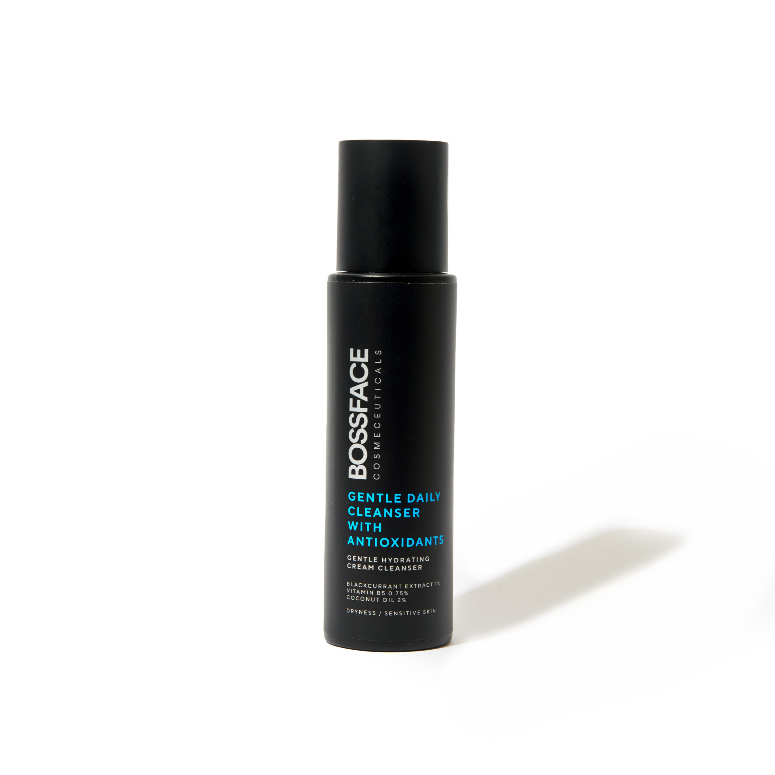 Bossface gentle cleanser in a black bottle standing with white background
