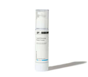 Bfx liquid dressing repair cream skincare product in a white bottle with a white background