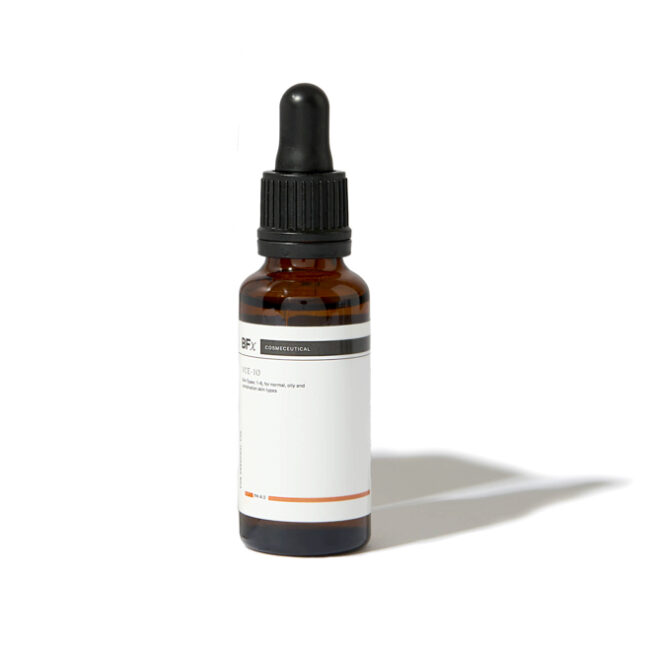 Bfx VCE10 serum in a glass bottle on a white background