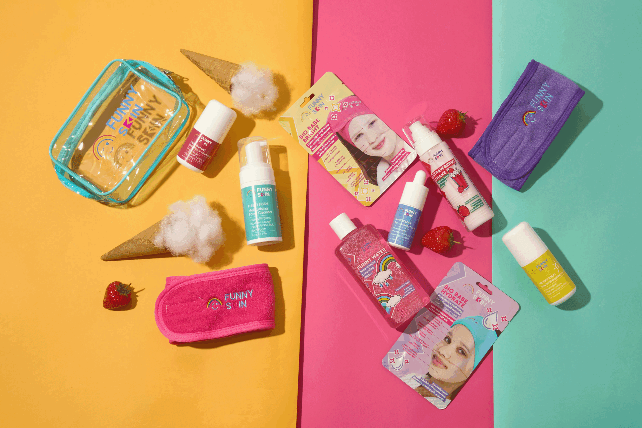 All funny skin products lying on a pink and orange background